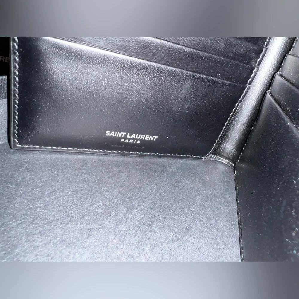 YSL black leather mens wallet! Comes with box, tags, & paperwork in photos!